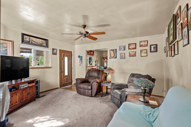 1704 Ashby Rd, Shasta Lake, CA 96019 - carpeted living room featuring baseboards and ceiling fan