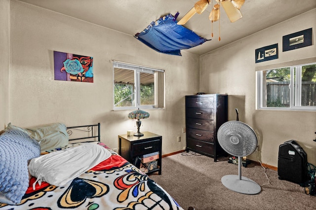 1704 Ashby Rd, Shasta Lake, CA 96019 - bedroom with carpet, multiple windows, baseboards, and a ceiling fan
