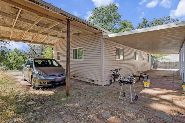1704 Ashby Rd, Shasta Lake, CA 96019 - view of property exterior with an attached carport and crawl space