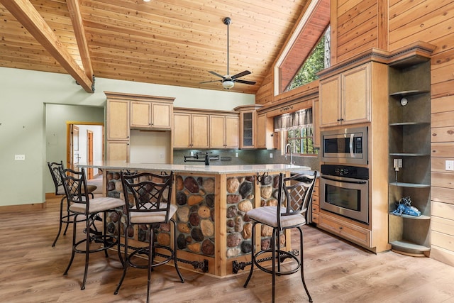 7185 Whispering Winds Ct, Shingletown, CA 96088 - kitchen with stainless steel appliances, wood ceiling, open shelves, tasteful backsplash, and light wood finished floors