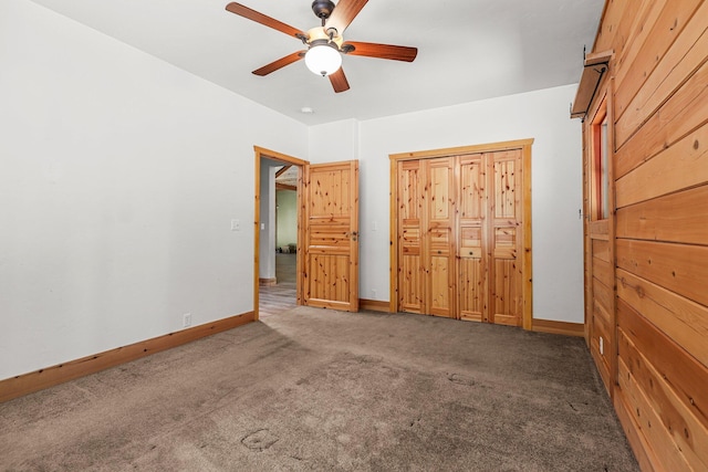 7185 Whispering Winds Ct, Shingletown, CA 96088 - unfurnished bedroom featuring carpet flooring, baseboards, and a ceiling fan