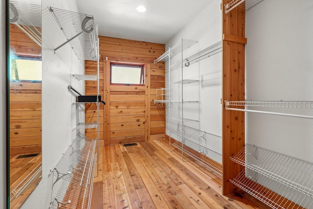 7185 Whispering Winds Ct, Shingletown, CA 96088 - walk in closet featuring light wood-type flooring