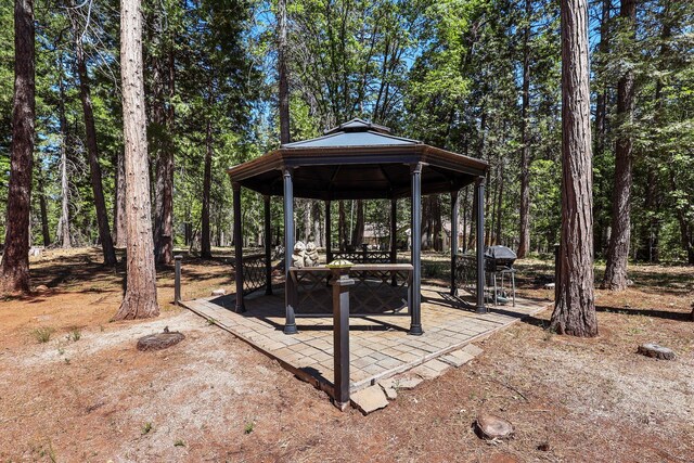 7185 Whispering Winds Ct, Shingletown, CA 96088 - surrounding community with a gazebo and a patio area