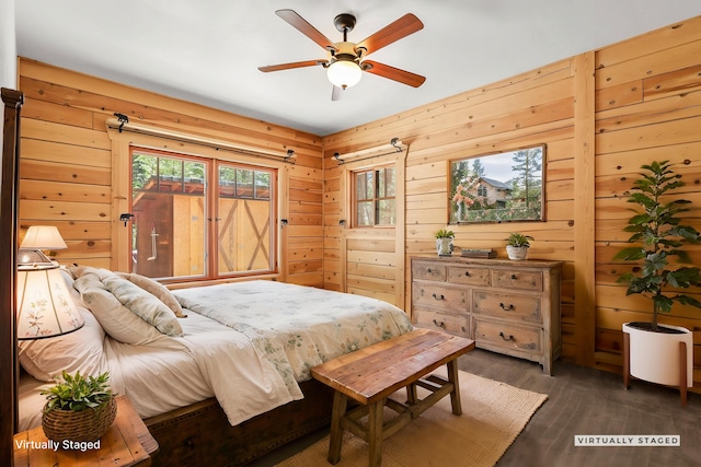 7185 Whispering Winds Ct, Shingletown, CA 96088 - bedroom with dark wood-style floors and wooden walls