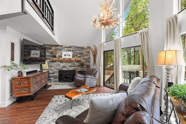 30681 Sleepy Hollow Dr, Shingletown, CA 96088 - living area featuring a chandelier, wood finished floors, and high vaulted ceiling