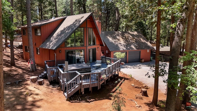 30681 Sleepy Hollow Dr, Shingletown, CA 96088 - back of house with roof with shingles and a wooden deck