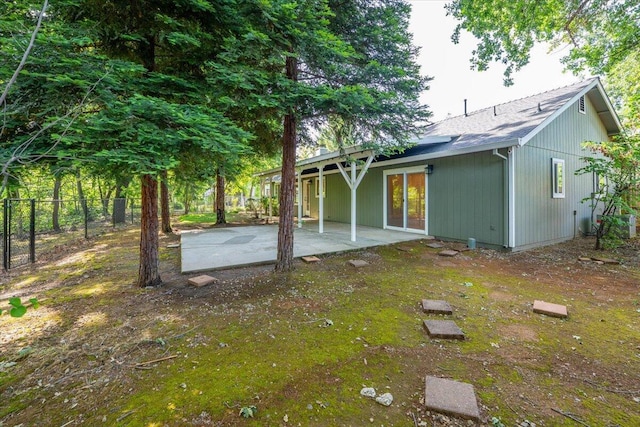 507 Olympic St, Redding, CA 96003 - rear view of property featuring fence and a patio