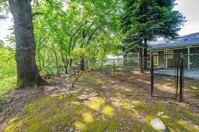 507 Olympic St, Redding, CA 96003 - fenced yard featuring a gate