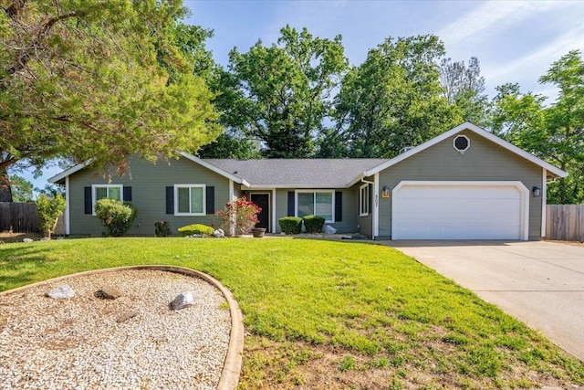 507 Olympic St, Redding, CA 96003 - single story home featuring a garage and concrete driveway