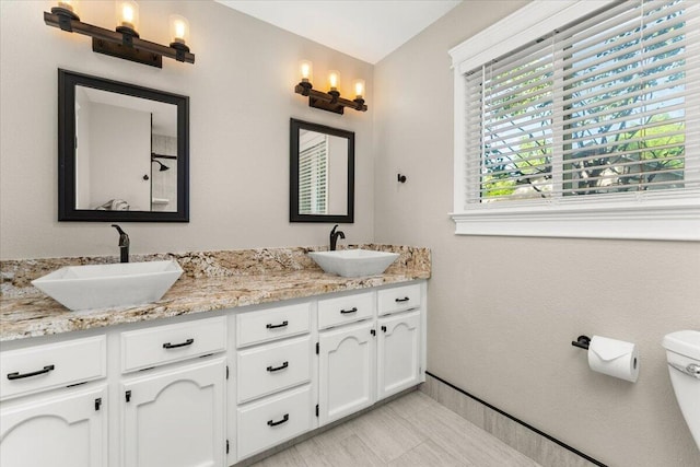 507 Olympic St, Redding, CA 96003 - full bathroom featuring toilet and double vanity