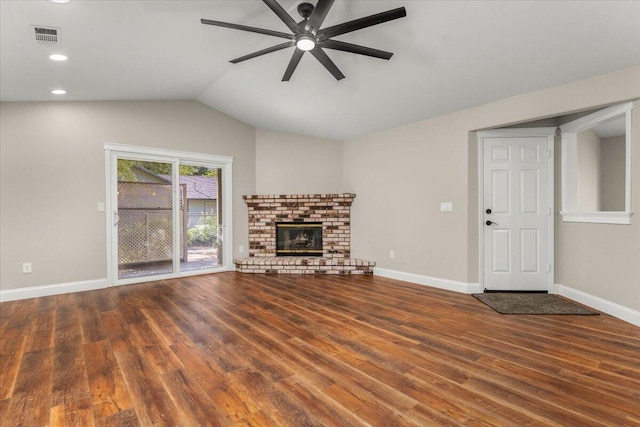 507 Olympic St, Redding, CA 96003 - unfurnished living room with ceiling fan, wood finished floors, lofted ceiling, baseboards, and a fireplace