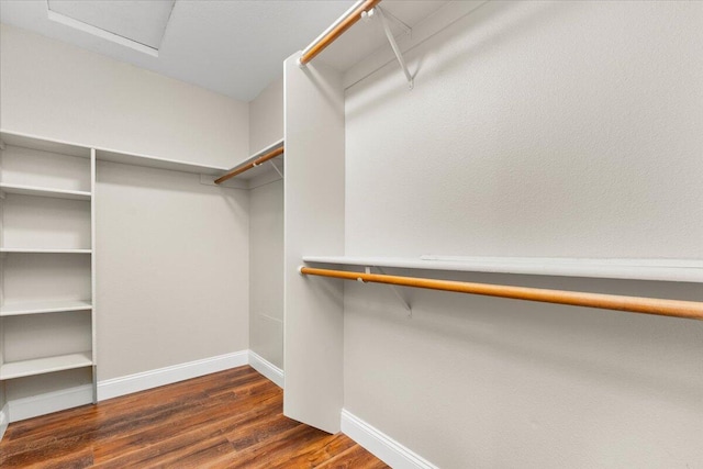 507 Olympic St, Redding, CA 96003 - walk in closet with wood finished floors and attic access