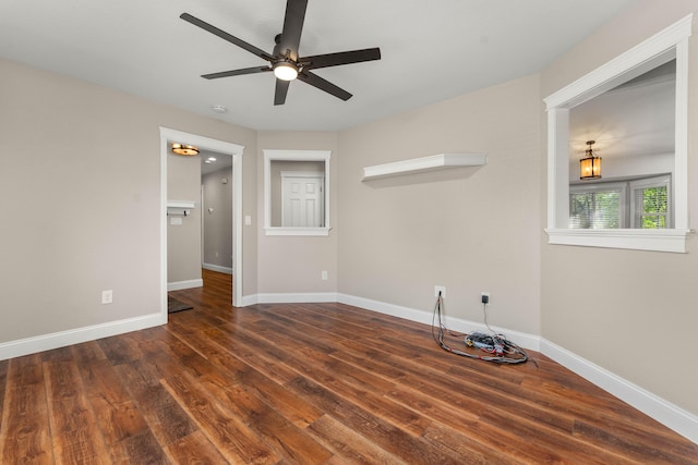 507 Olympic St, Redding, CA 96003 - empty room with wood finished floors, ceiling fan, and baseboards