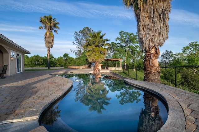 4684 Oak Glen Dr, Redding, CA 96001 - outdoor pool featuring fence and a patio area