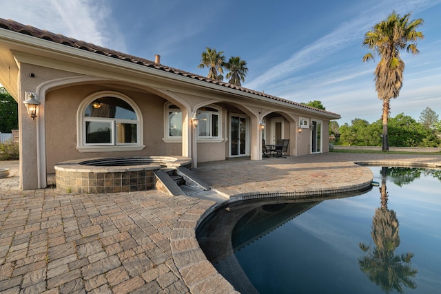 4684 Oak Glen Dr, Redding, CA 96001 - view of swimming pool featuring a patio area and a pool with connected hot tub