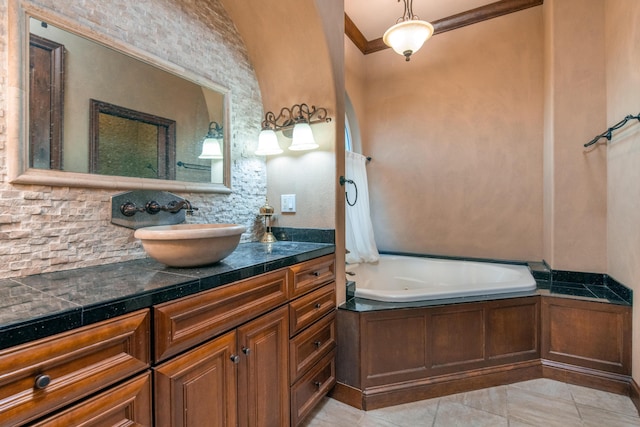 4684 Oak Glen Dr, Redding, CA 96001 - full bathroom featuring a tub, vanity, backsplash, tile patterned flooring, and crown molding