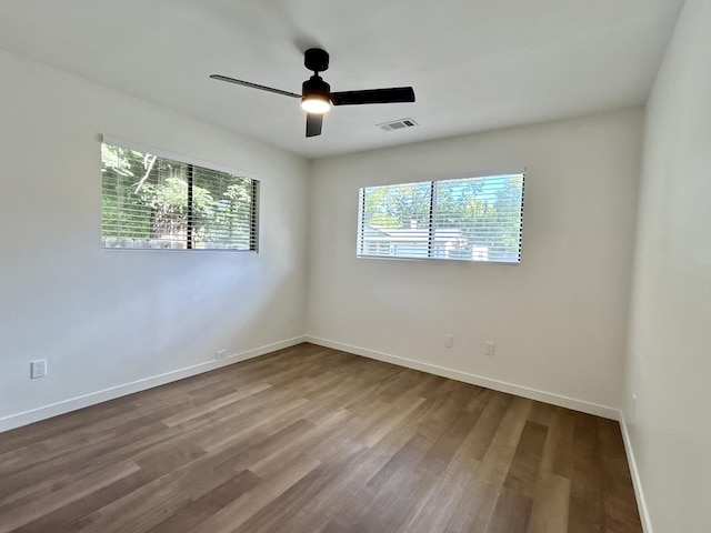 1808 Del Mar Ave, Redding, CA 96003 - empty room featuring wood finished floors, a ceiling fan, and baseboards