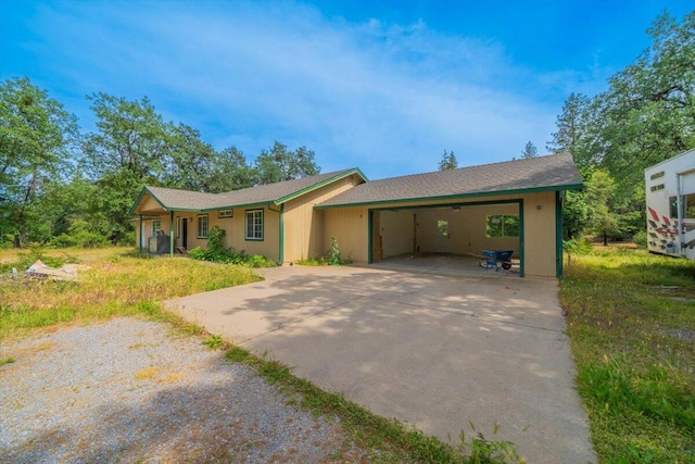 17171 Flanagan Rd, Redding, CA 96003 - ranch-style home with concrete driveway and a garage