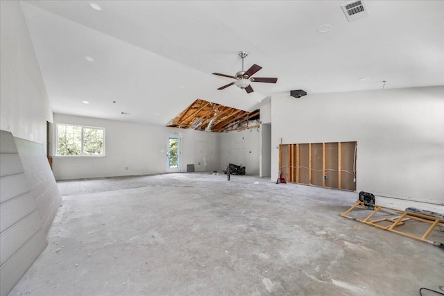 17171 Flanagan Rd, Redding, CA 96003 - unfurnished living room with concrete floors, vaulted ceiling, and a ceiling fan