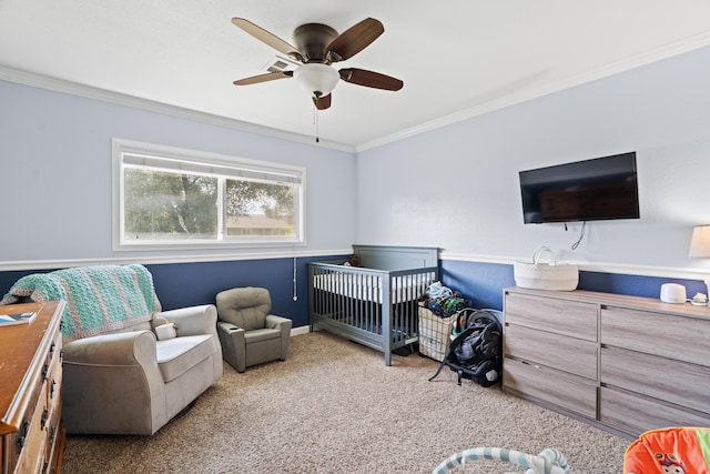 3689 Suzanne Way, Redding, CA 96002 - carpeted bedroom featuring crown molding, a nursery area, and a ceiling fan