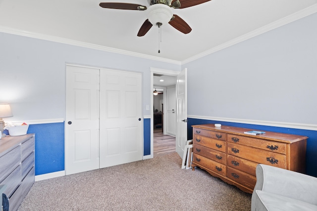 3689 Suzanne Way, Redding, CA 96002 - carpeted bedroom with ornamental molding, a closet, a ceiling fan, and baseboards