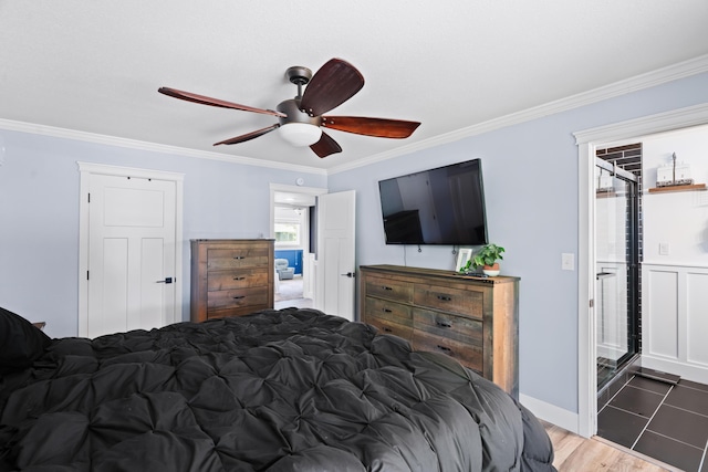 3689 Suzanne Way, Redding, CA 96002 - bedroom featuring crown molding, ceiling fan, and wood finished floors