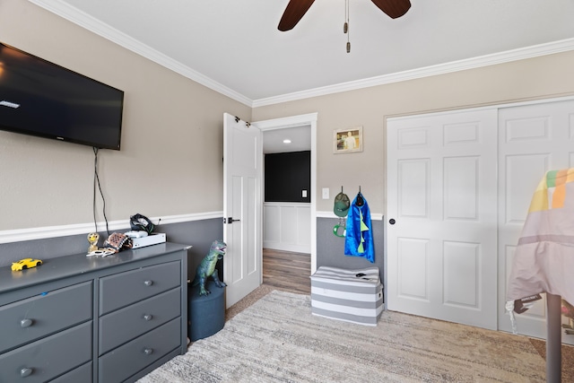 3689 Suzanne Way, Redding, CA 96002 - bedroom featuring ornamental molding, a ceiling fan, wood finished floors, and a closet