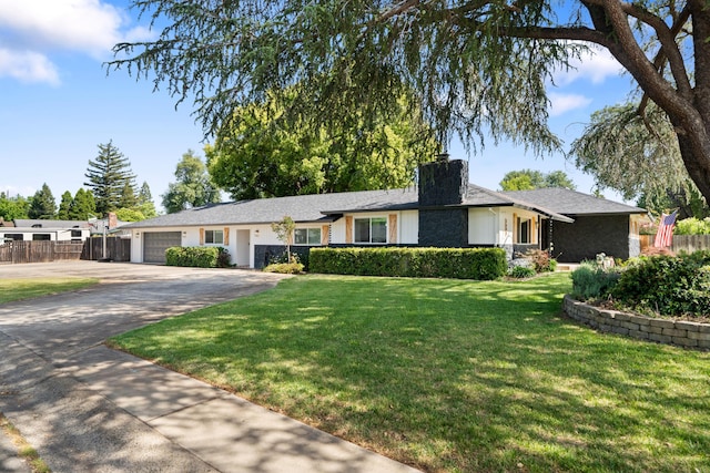 3689 Suzanne Way, Redding, CA 96002 - ranch-style home with a chimney, a garage, and driveway