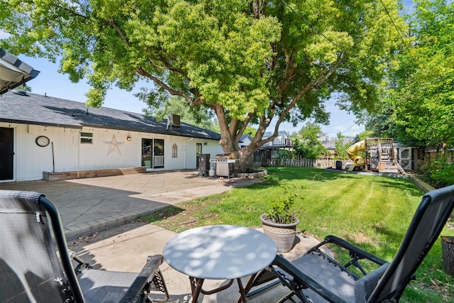 3689 Suzanne Way, Redding, CA 96002 - view of yard featuring a playground and a patio area