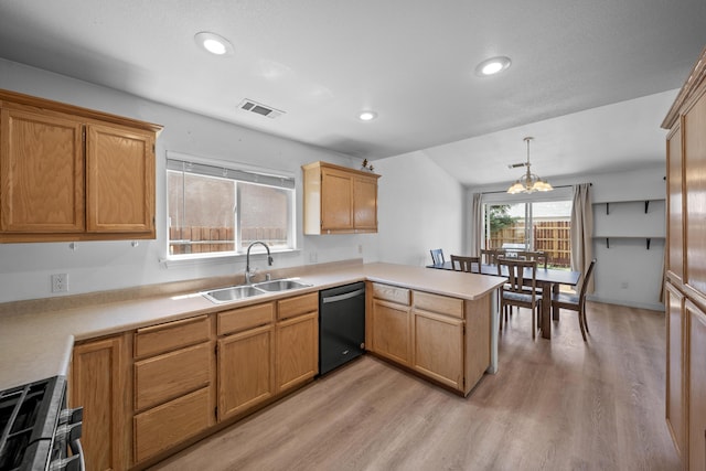 1706 Stanton Dr, Shasta Lake, CA 96019 - kitchen featuring dishwasher, a peninsula, light wood finished floors, gas range oven, and light countertops