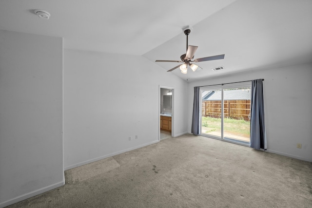 1706 Stanton Dr, Shasta Lake, CA 96019 - spare room featuring vaulted ceiling, light carpet, a ceiling fan, and a smoke detector