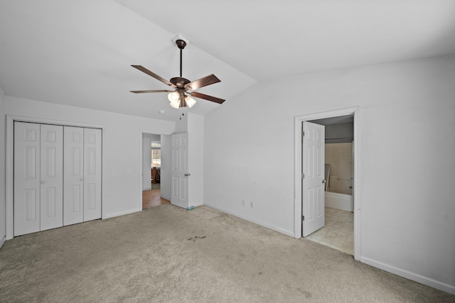 1706 Stanton Dr, Shasta Lake, CA 96019 - unfurnished bedroom featuring carpet, lofted ceiling, ensuite bathroom, a closet, and ceiling fan