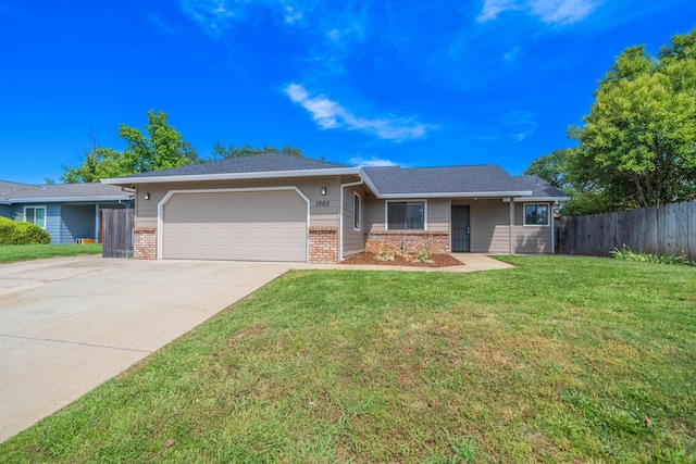 single story home with brick siding, a garage, and concrete driveway