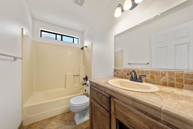 full bathroom featuring vanity, toilet, shower / bath combination, and backsplash