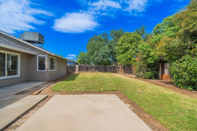 view of yard with a patio area and cooling unit