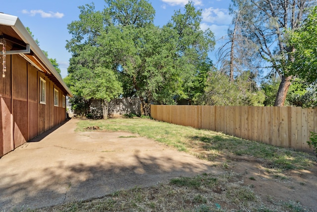 fenced backyard featuring a patio