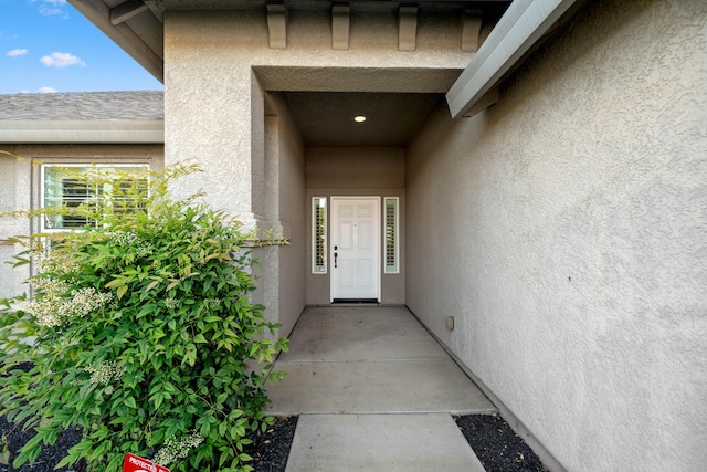 6552 Capitola Pl, Redding, CA 96001 - view of exterior entry with stucco siding