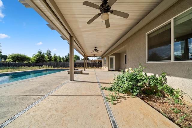 6552 Capitola Pl, Redding, CA 96001 - fenced backyard with a ceiling fan and a patio