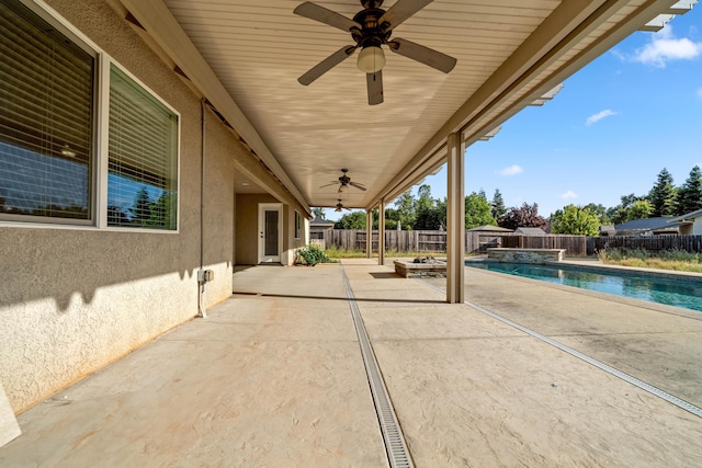 6552 Capitola Pl, Redding, CA 96001 - fenced backyard featuring a patio, a ceiling fan, and a pool with connected hot tub
