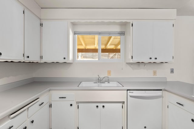 kitchen with dishwasher, a sink, white cabinetry, and light countertops