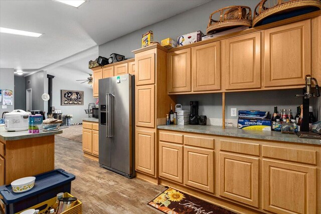 16605 Lassen Ave, Anderson, CA 96007 - kitchen with high end refrigerator, light wood finished floors, and ceiling fan