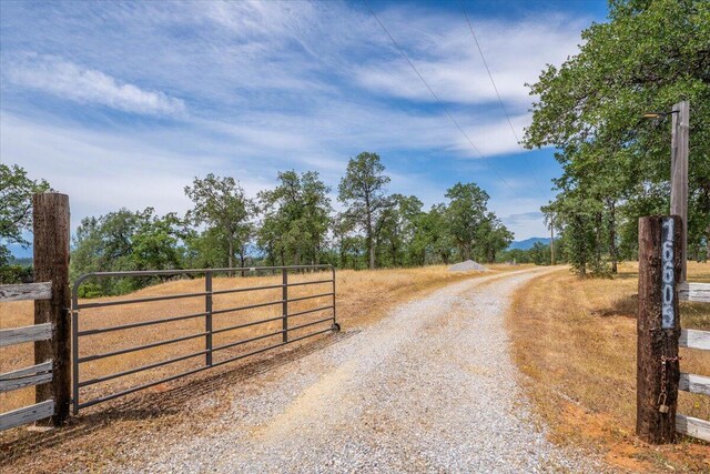 16605 Lassen Ave, Anderson, CA 96007 - view of street with a gate and a view of rural / pastoral area