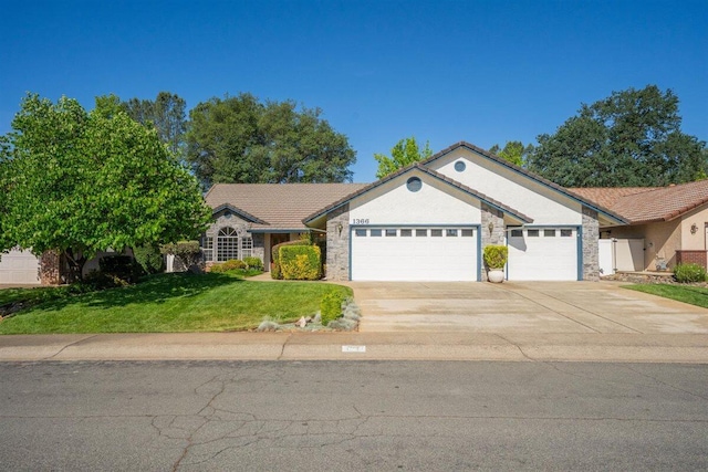 1366 Carla Cir, Redding, CA 96003 - ranch-style home with a garage, concrete driveway, a front lawn, a tile roof, and stucco siding