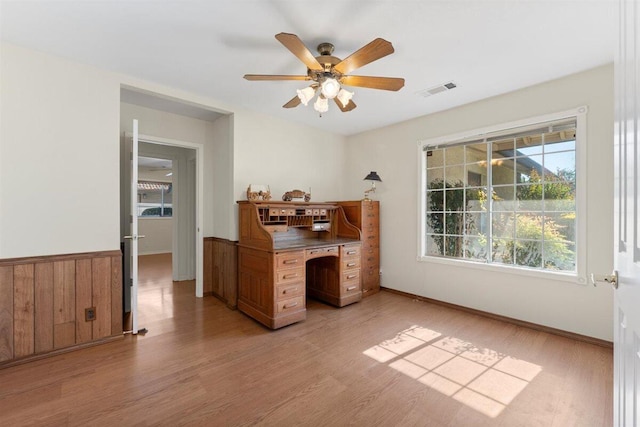 1366 Carla Cir, Redding, CA 96003 - home office with ceiling fan, light wood-type flooring, and baseboards