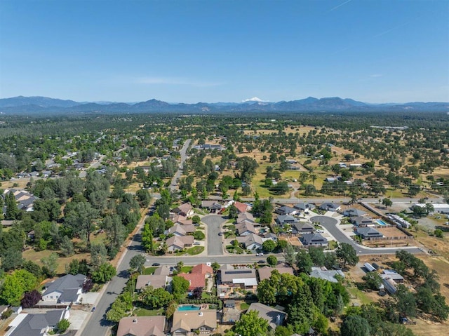 1366 Carla Cir, Redding, CA 96003 - aerial view of property's location with mountains and nearby suburban area