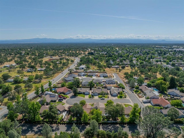 1366 Carla Cir, Redding, CA 96003 - aerial perspective of suburban area featuring a mountain backdrop