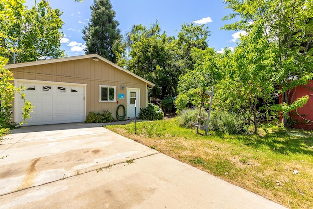 1556 Santa Fe Ave, Redding, CA 96003 - view of front of house featuring driveway and an attached garage