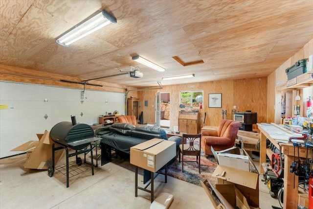 2125 Lava, Mccloud, CA 96057 - garage featuring a garage door opener and wood walls