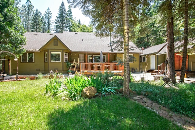 7289 Clarabelle Ln, Shingletown, CA 96088 - rear view of house with a deck, roof with shingles, a lawn, entry steps, and a patio