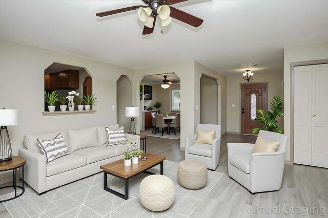 7289 Clarabelle Ln, Shingletown, CA 96088 - living area featuring a ceiling fan and light wood-style flooring